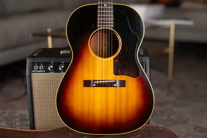 Vintage 1950s Gibson LG-2 acoustic guitar with large pickguard and original small rectangular rosewood bridge