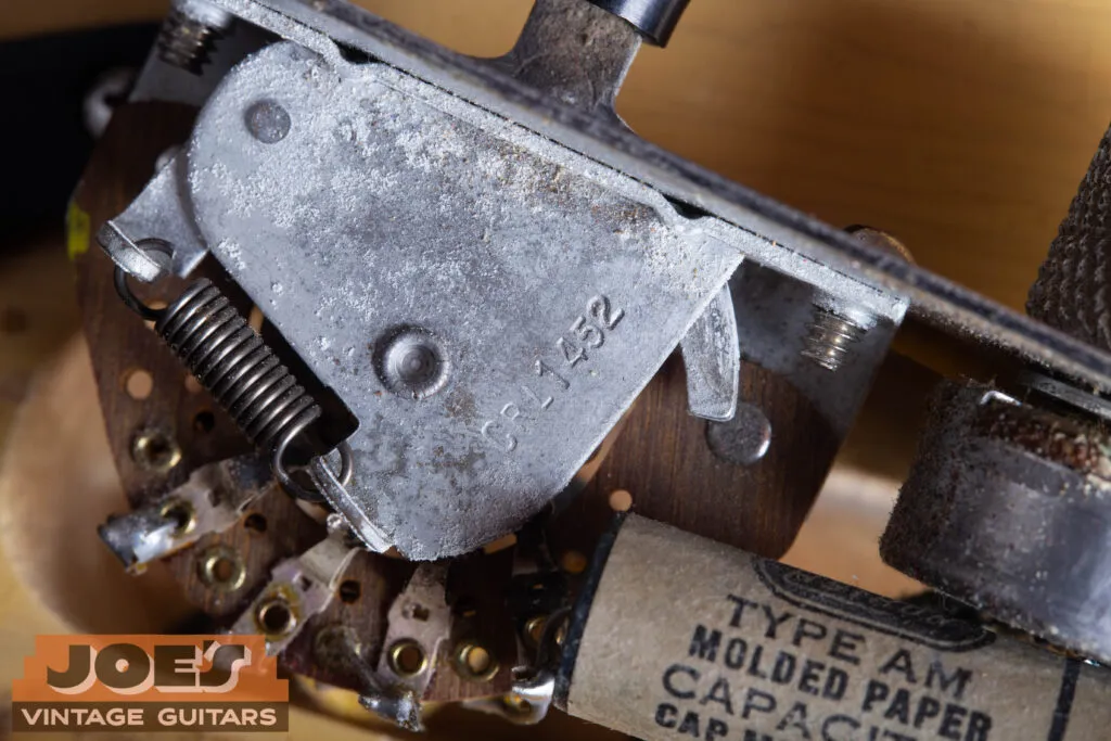 Internal view of a 1952 Fender Telecaster 3-way selector switch clearly showing the “CRL 1452” factory stamp.