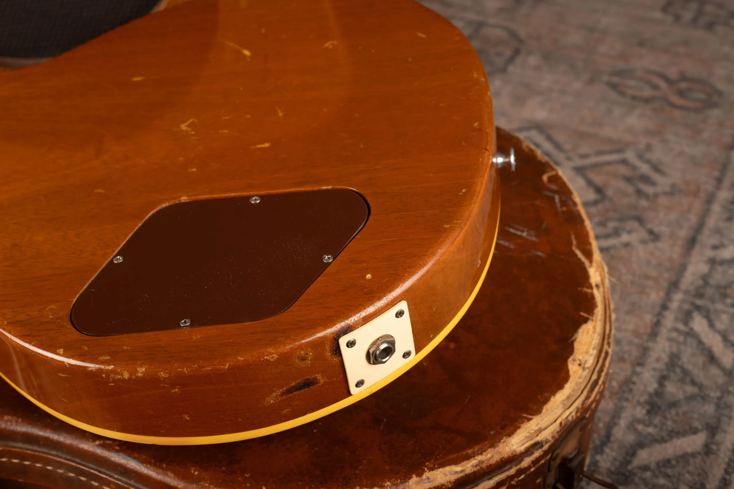 1954 Gibson Les Paul Goldtop original cream plastic output jack plate, correct mid-1950s color and material for authentication