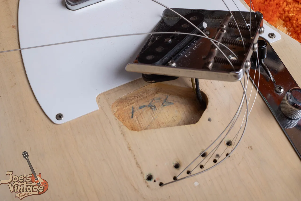 A body date written on the body inside the bridge pickup cavity of a 1956 Fender Telecaster