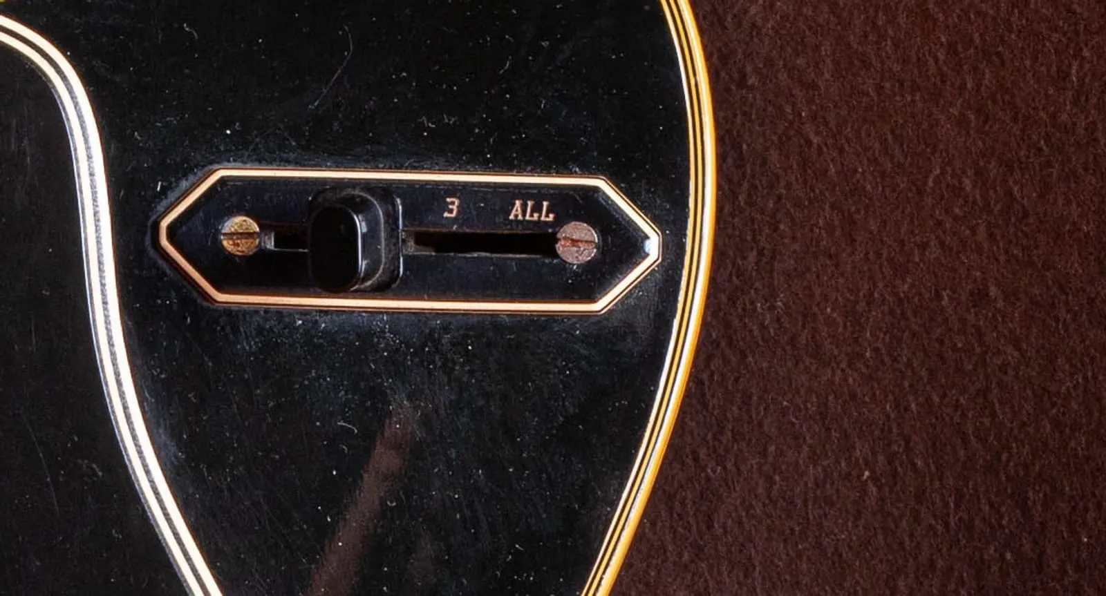 The four-way Switchmaster selector switch on a 1958 Gibson ES-5, its engraved plate reading positions one, two, three, and All.