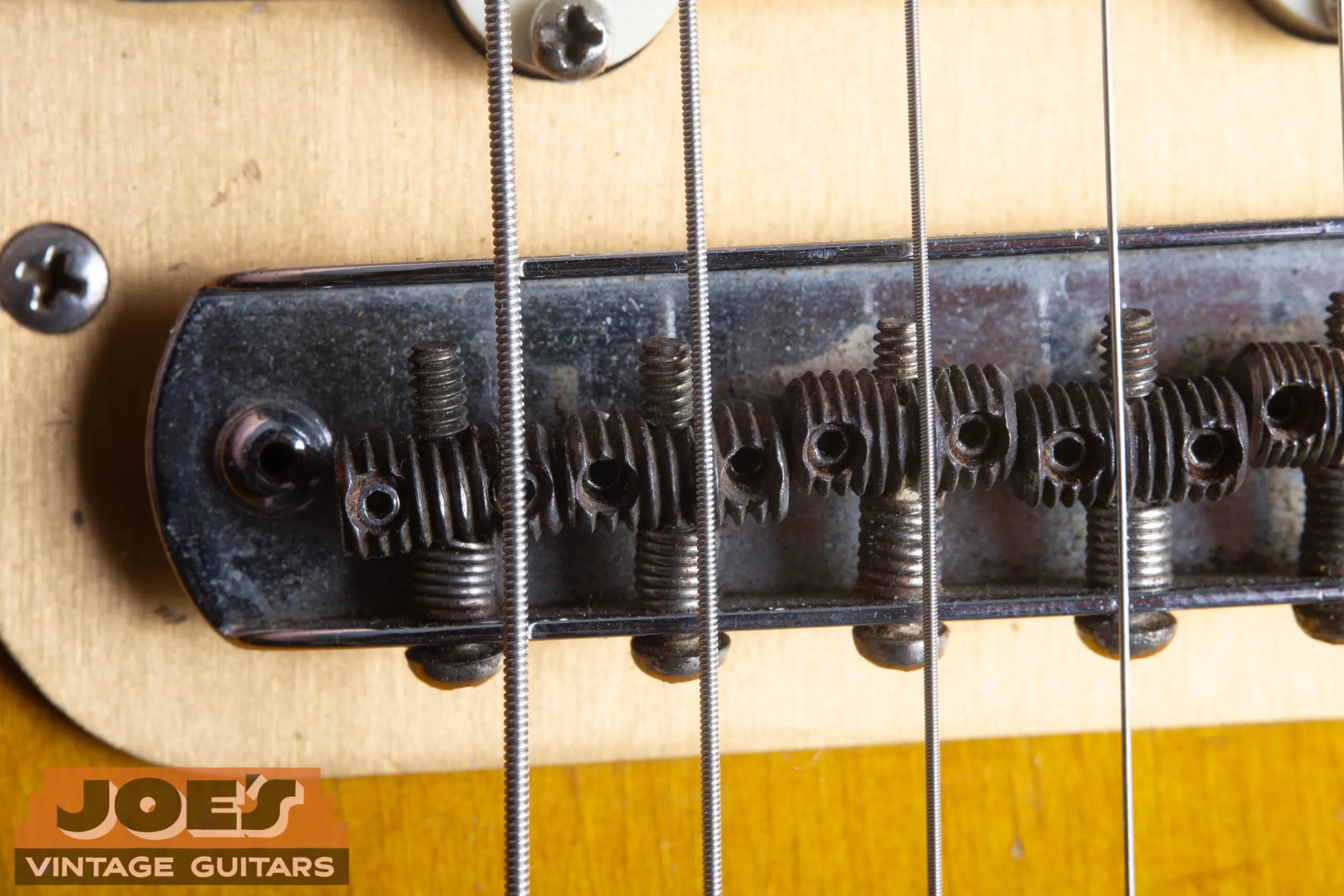 1959 Fender Jazzmaster floating bridge with threaded barrel saddles, individual cylindrical threaded saddles in rocking chrome base, period-correct pre-CBS bridge hardware
