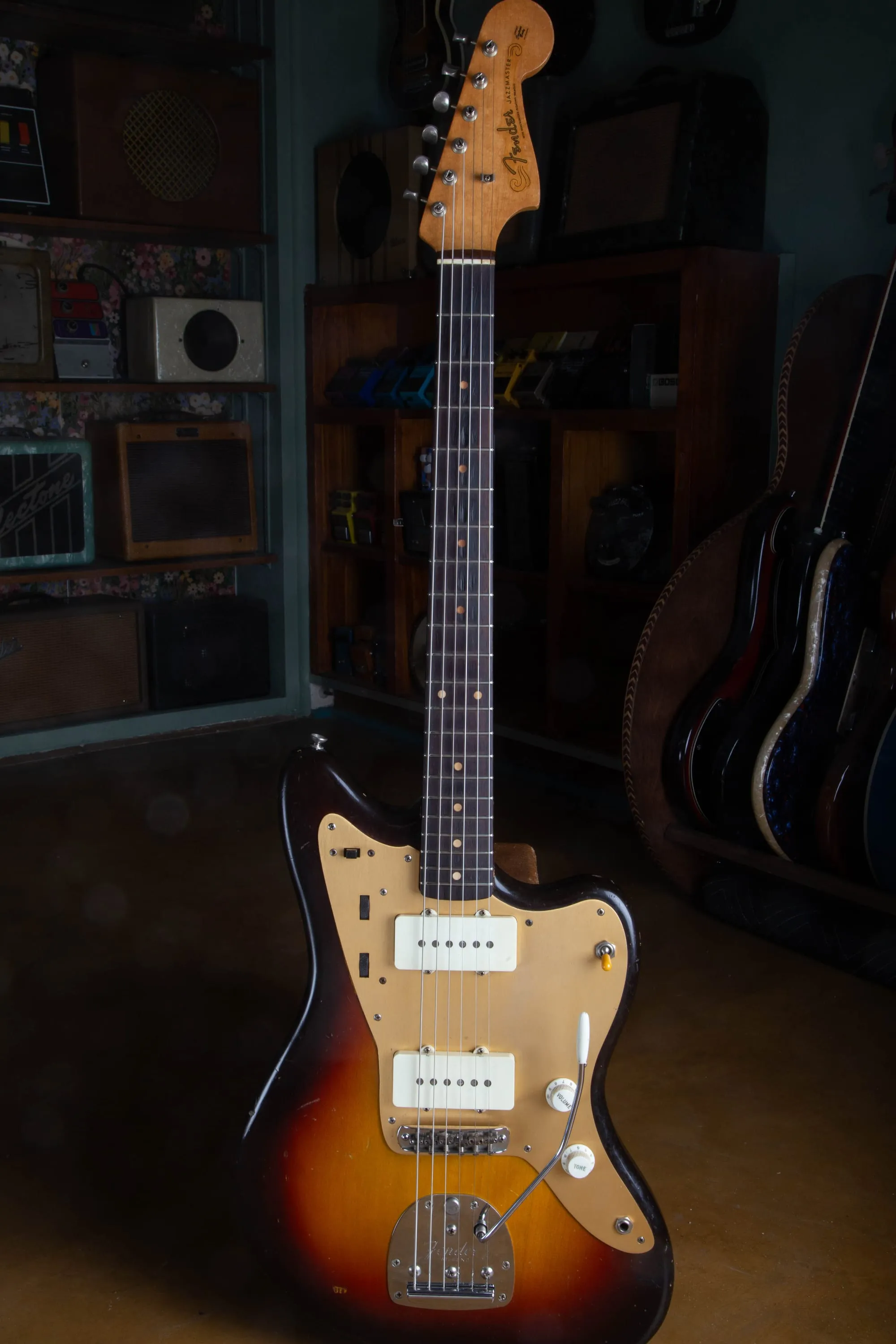 1959 Fender Jazzmaster in 3-color sunburst with its original gold anodized aluminum pickguard, full front view of a gold guard era example