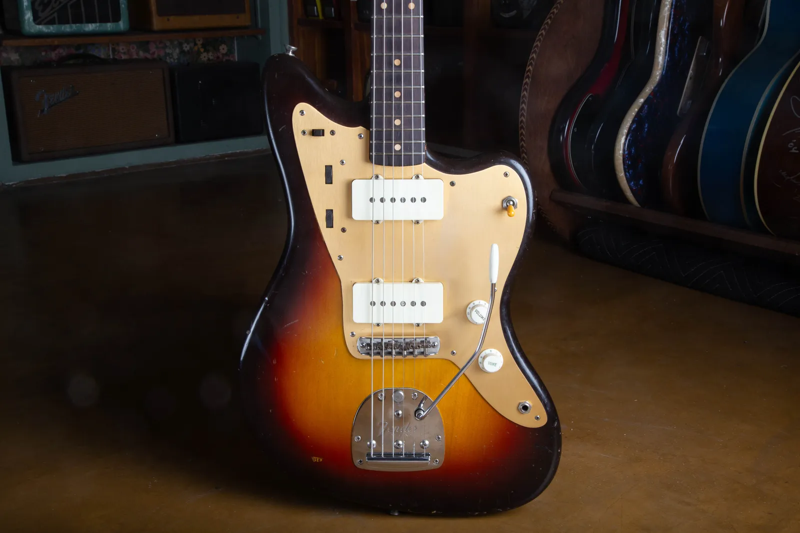 A 1959 Fender Jazzmaster in sunburst with a gold anodized aluminum pickguard