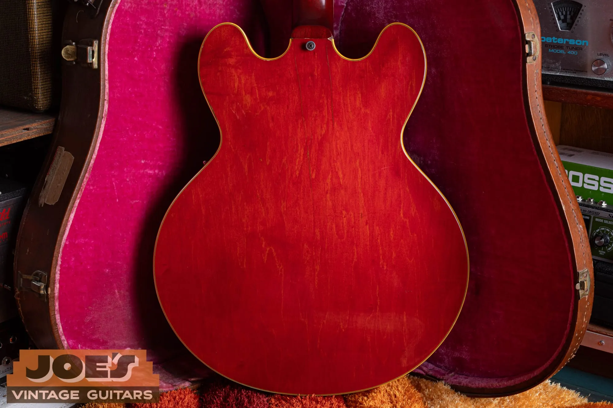 Back of a 1959 Gibson ES-355 in cherry showing an original faded finish with honest wear and fine lacquer checking.
