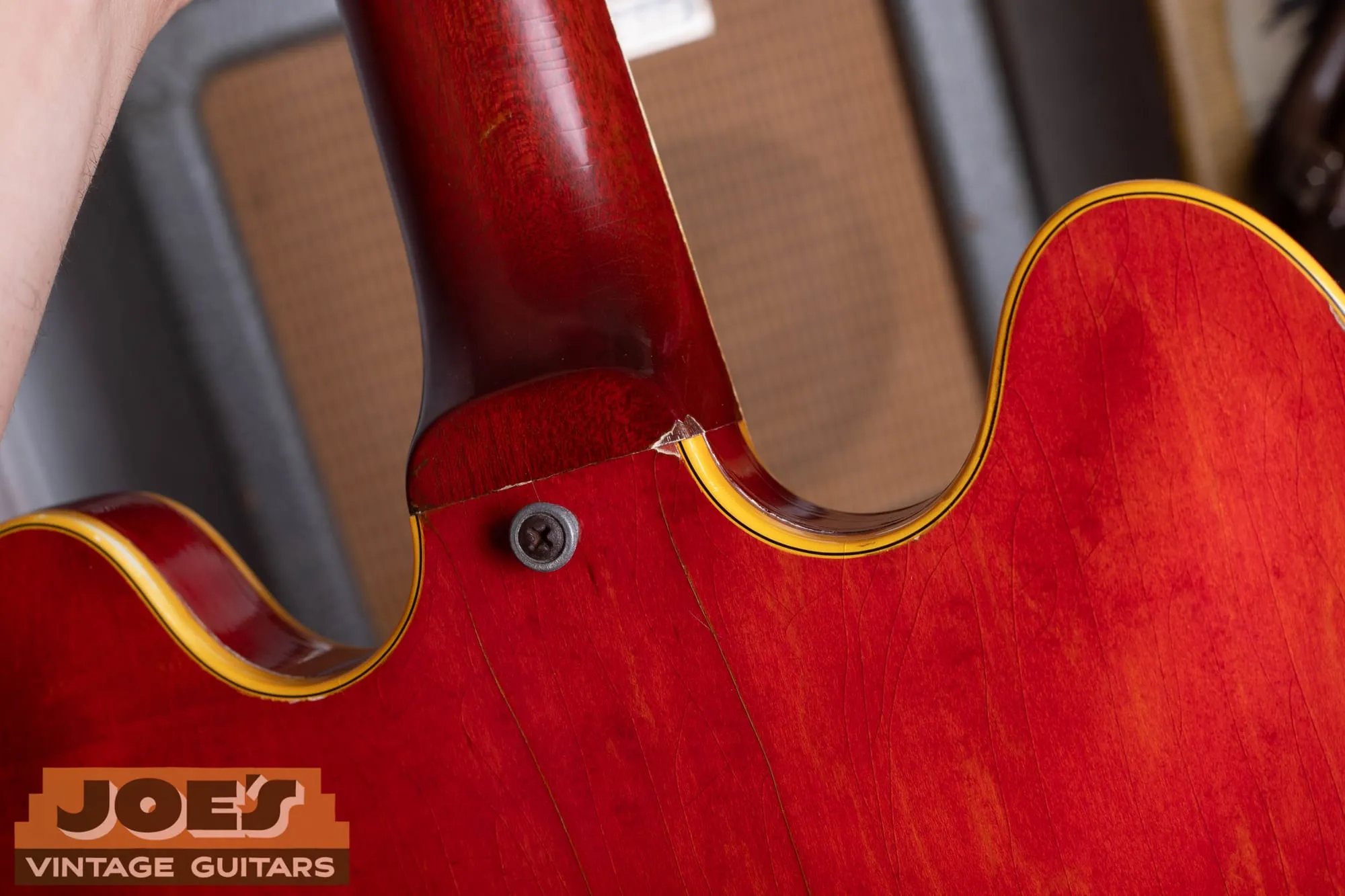 Bound f-hole and multi-ply body binding on a 1959 Gibson ES-355 in cherry, with honest lacquer checking across the top.