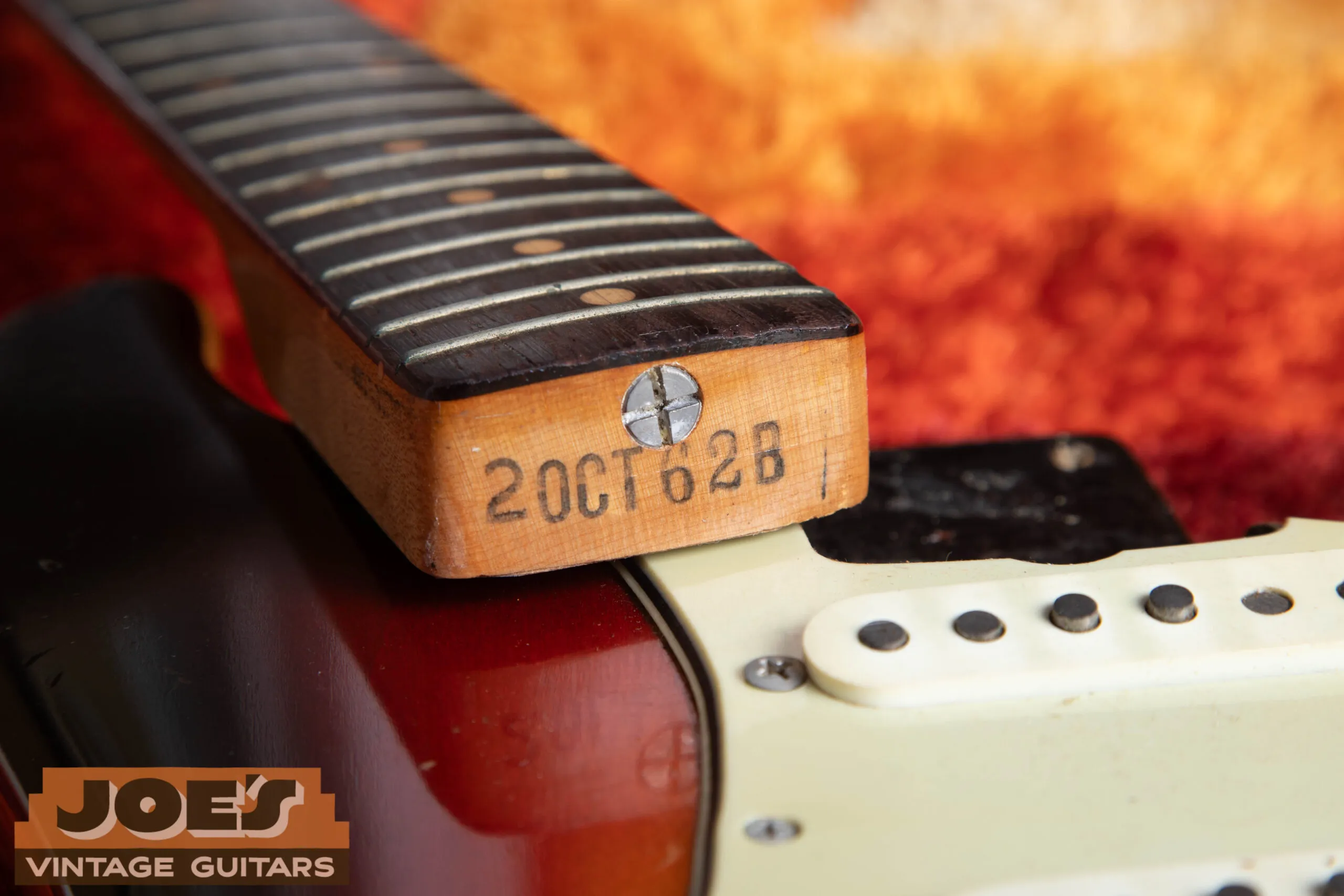 1962 Fender Stratocaster neck heel showing rubber-stamped month-year date on butt end of neck, most reliable single dating source for pre-CBS Fender