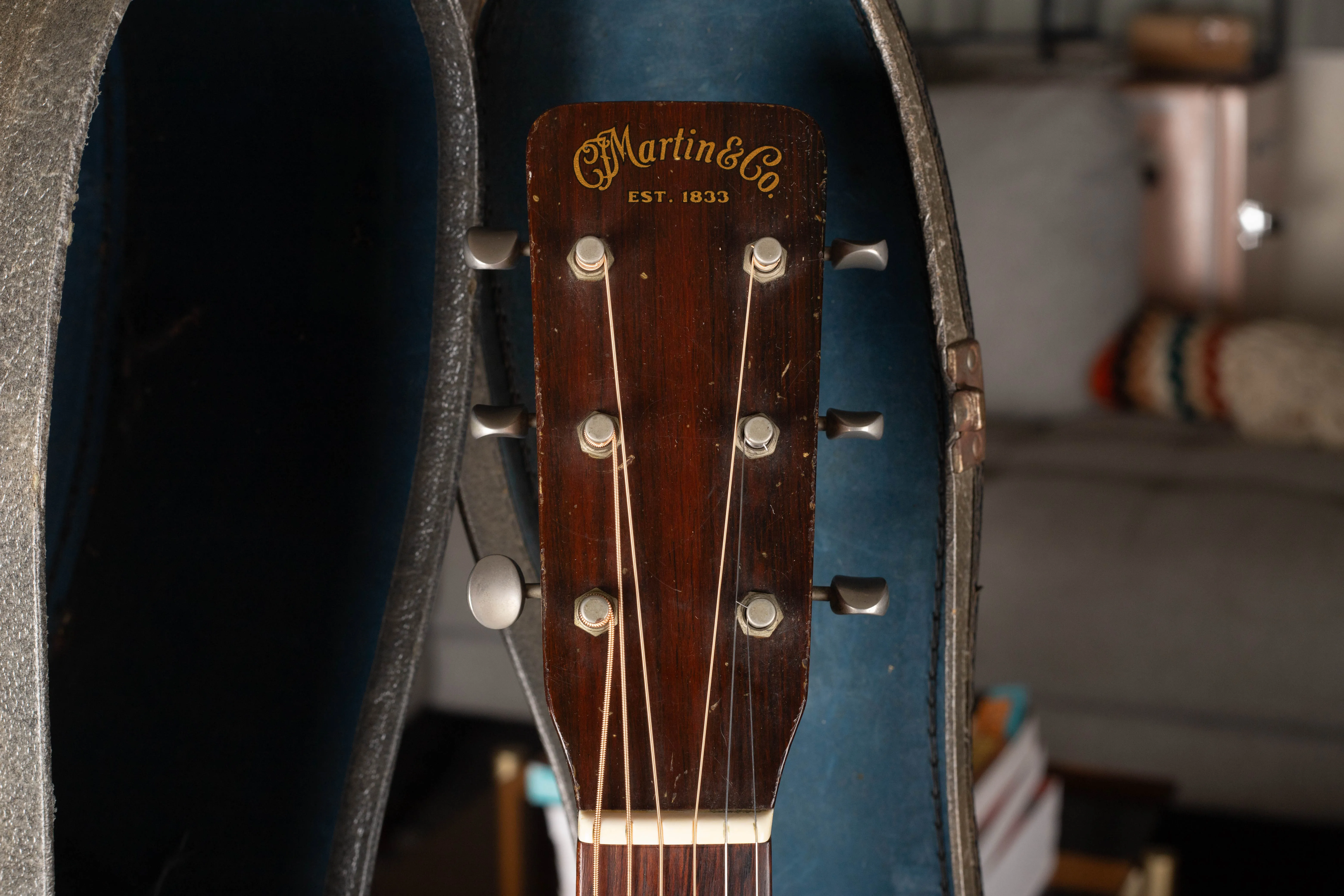 1962 Martin D-18 peghead showing tuner posts, bushings, buttons, and headstock finish
