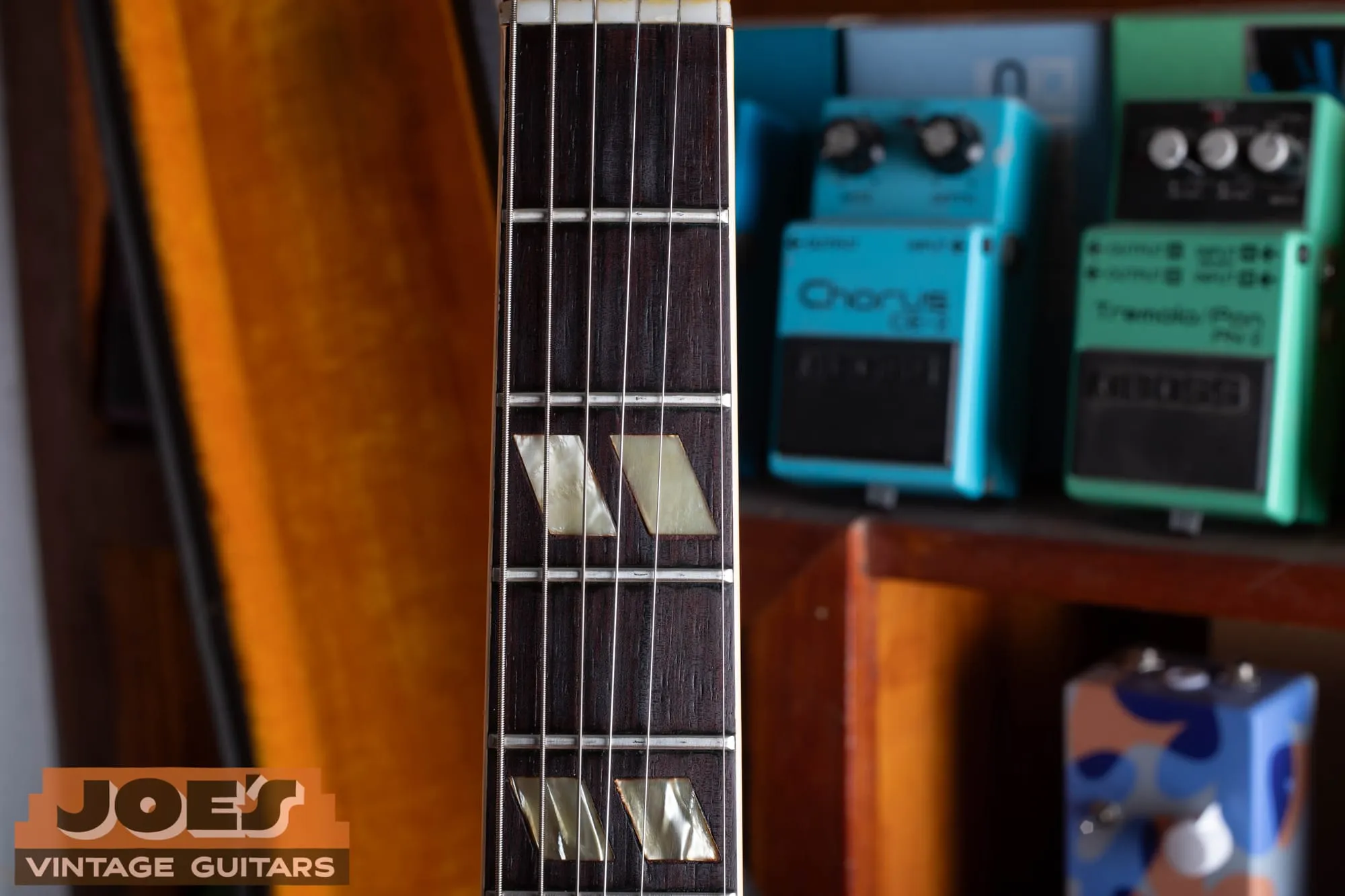 Close-up of the split-parallelogram fingerboard inlays and bound rosewood board on a 1963 Gibson ES-345.