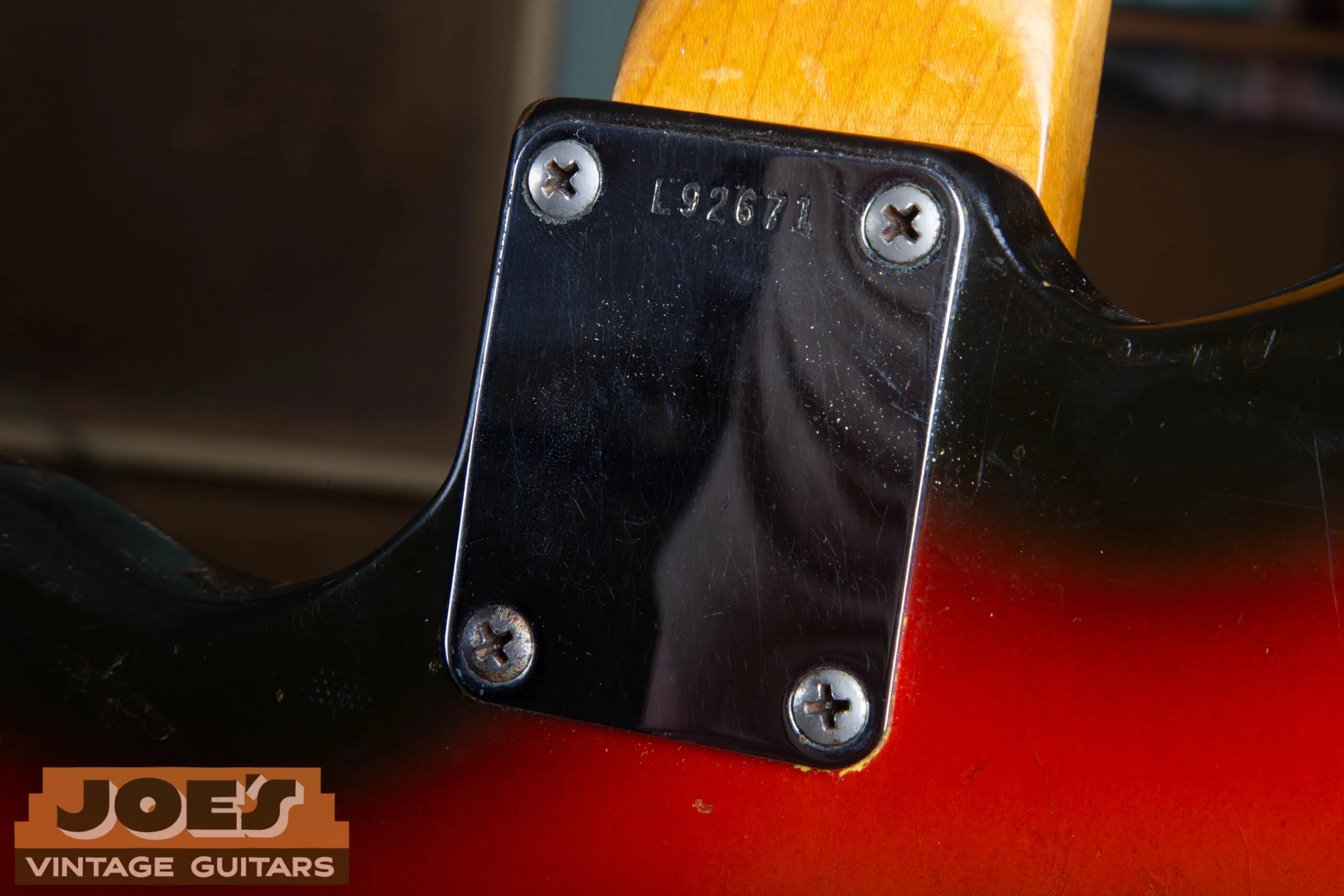 L-prefix serial number stamped neck plate on a 1965 Fender Jaguar