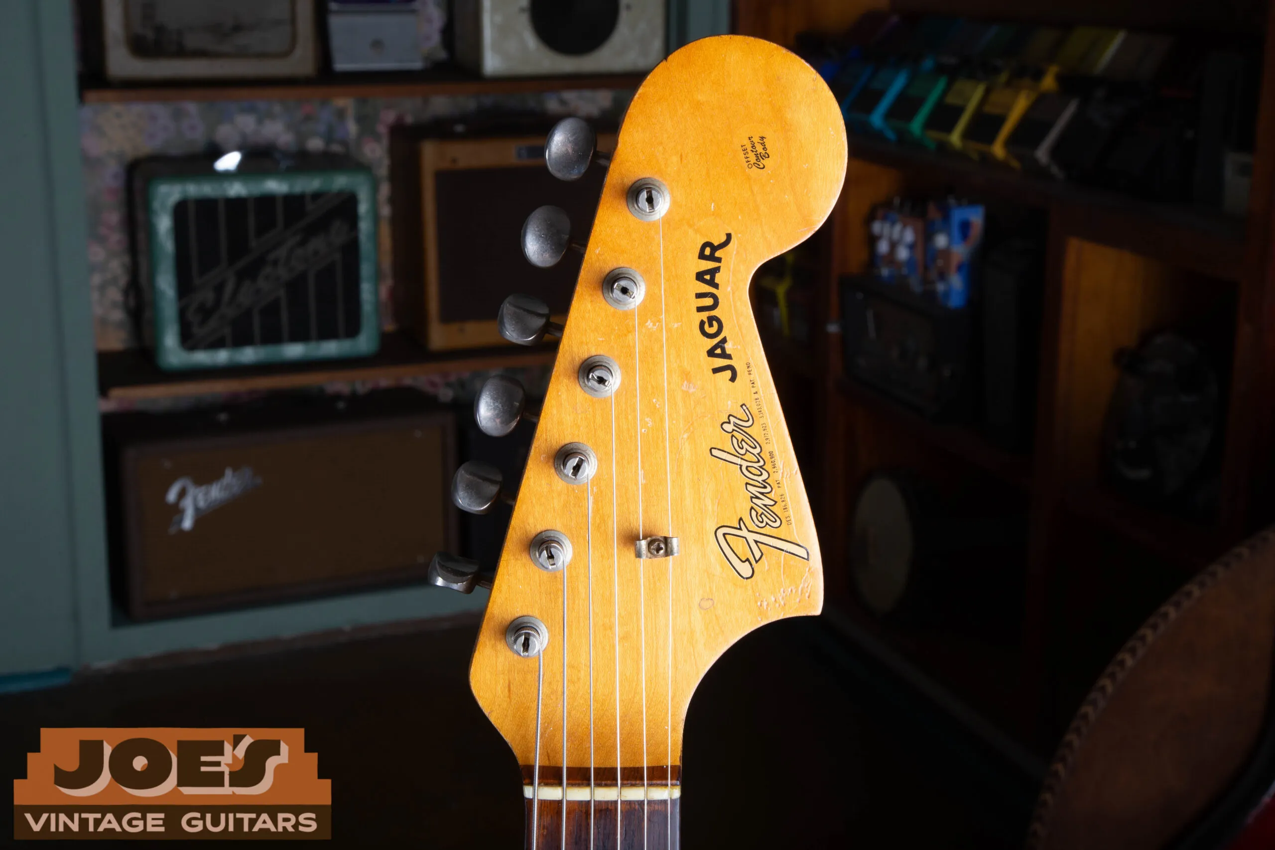 Gold transition headstock logo on a 1965 Fender Jaguar