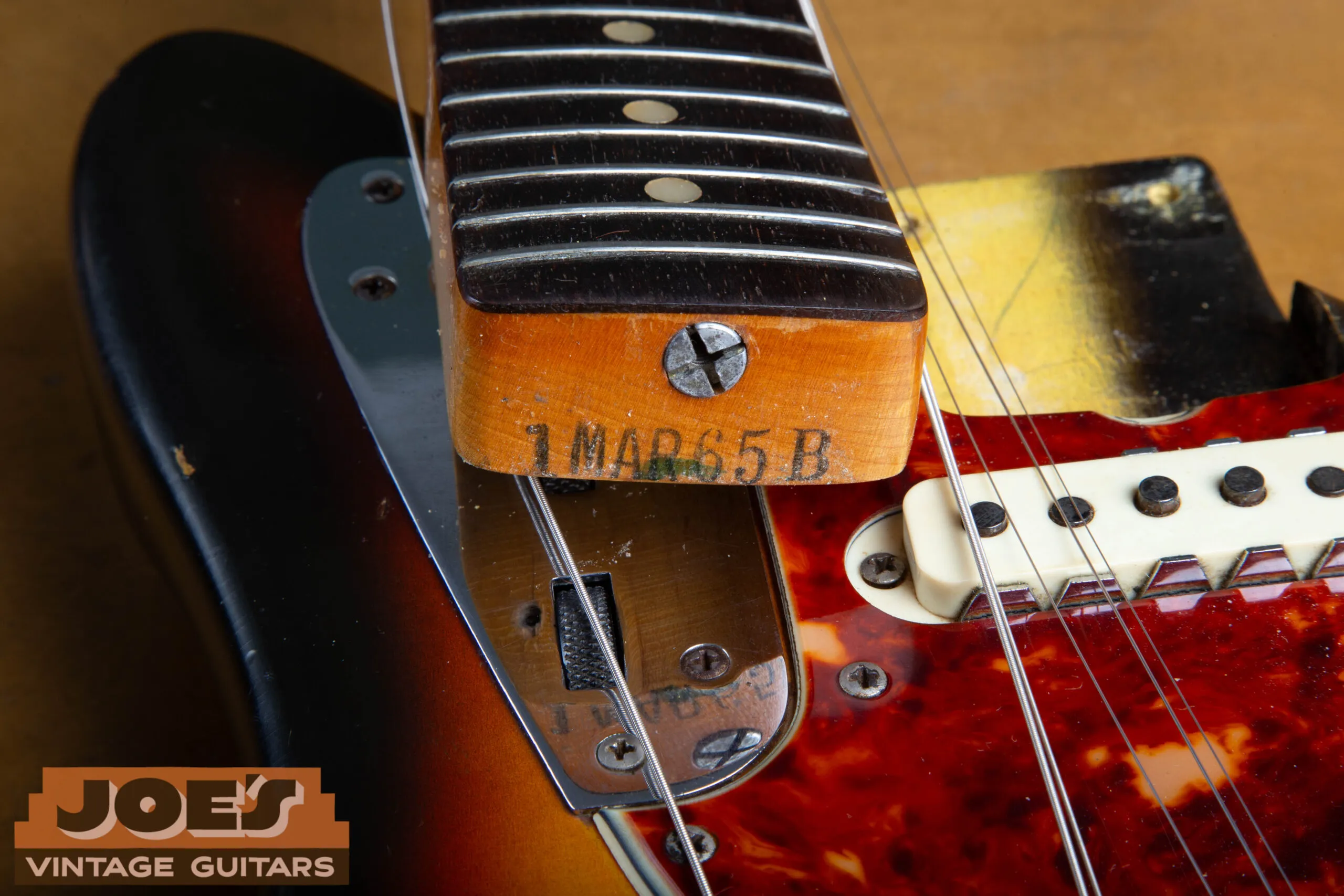 Inked neck heel date stamp on a 1965 Fender Jaguar neck