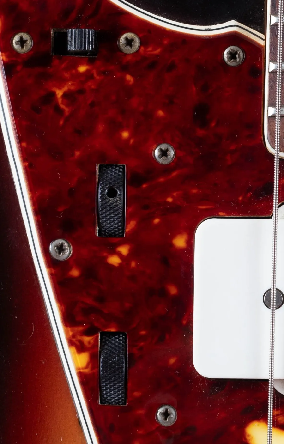 Fender Jazzmaster rhythm circuit slide switch and roller knobs, upper bout rhythm circuit with tone and volume wheels, chrome plate, pre-CBS lead-rhythm switching system