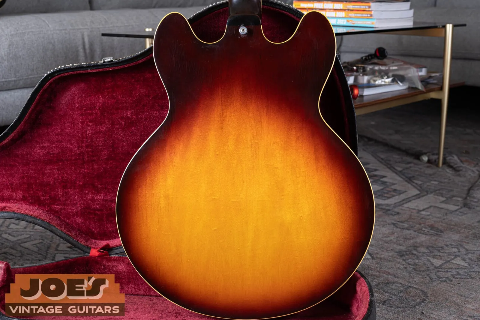 Back of a 1965 Gibson ES-335 in sunburst, original finish consistent across the body with no signs of refinishing or repair