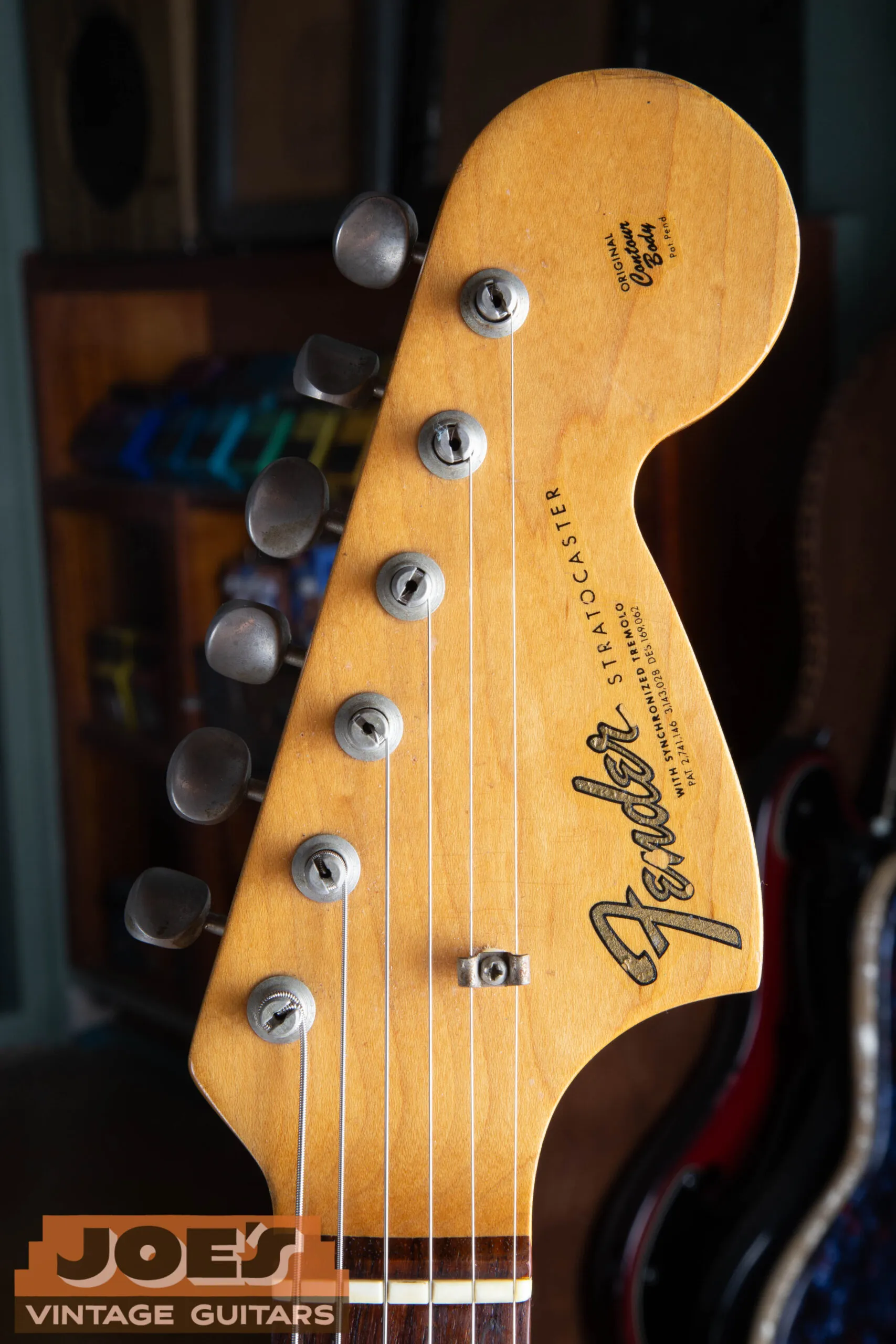 1966 Fender Stratocaster headstock with the gold transition logo and large CBS-style outline