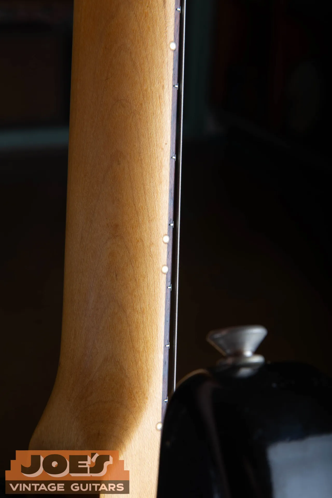 Pearloid side dots on the edge of a 1966 Fender Stratocaster neck