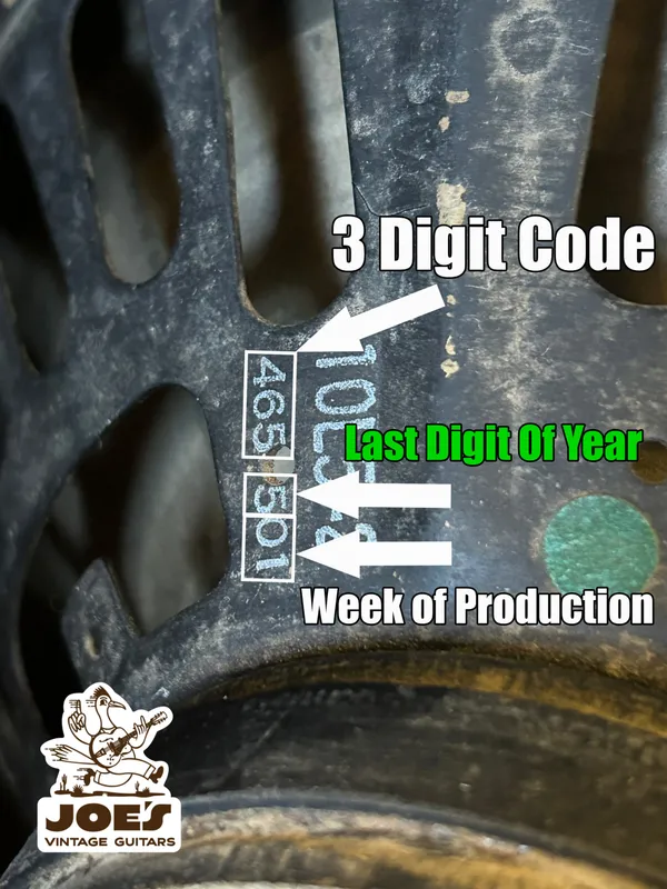 Close-up of a vintage Fender amplifier's speaker code, showing the 3-digit manufacturer code, year digit, and week of production for dating purposes