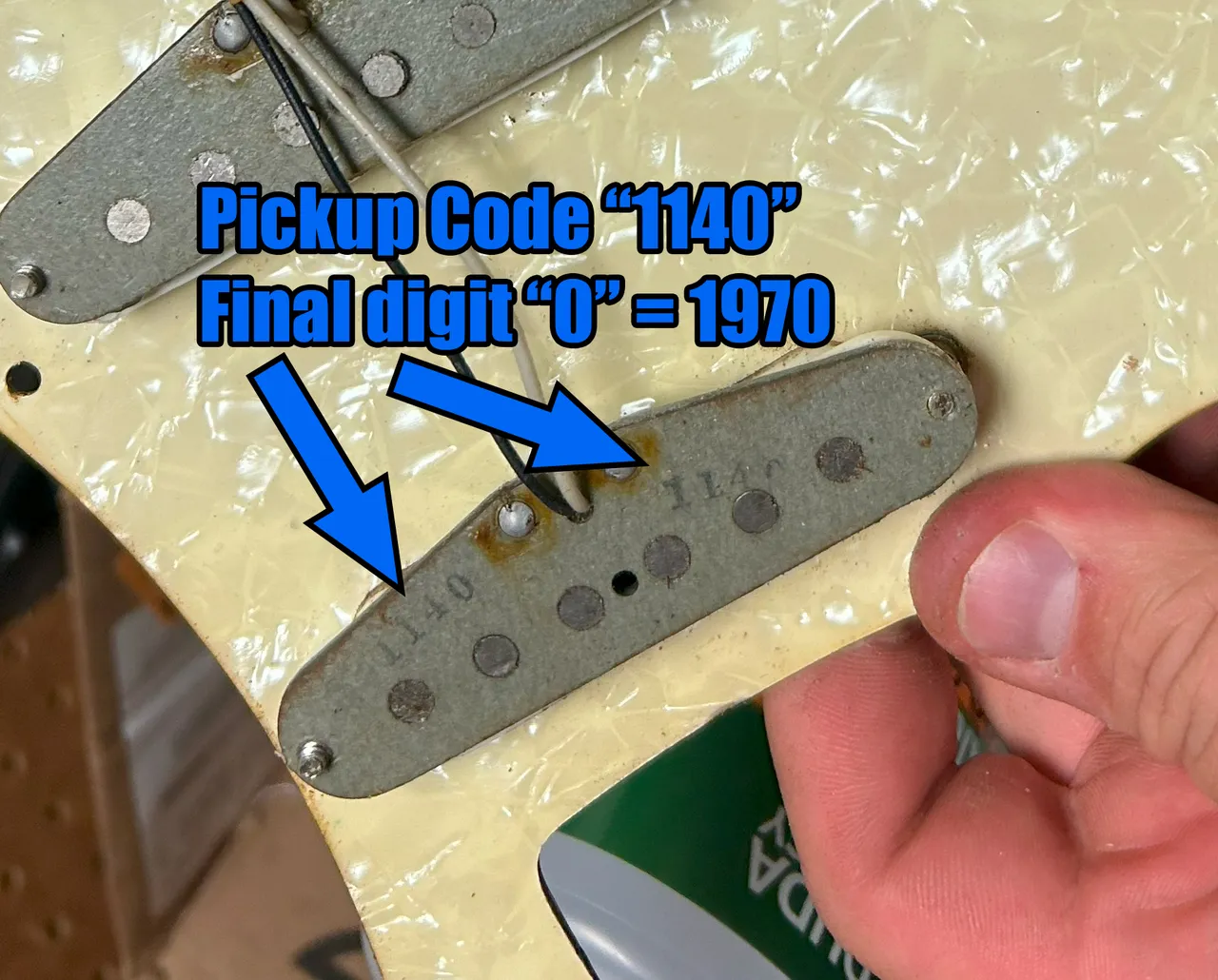 The base of a 1970s Fender pickup stamped with the numeric code 1140