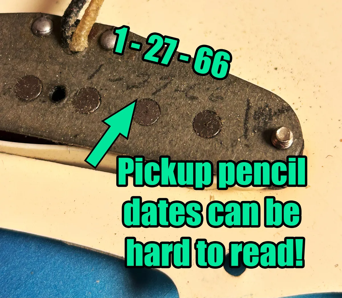 A faint pencil date reading 1-27-66 on the base of a vintage Fender pickup