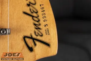 Fender S prefix serial number on the front of the headstock, 1970s