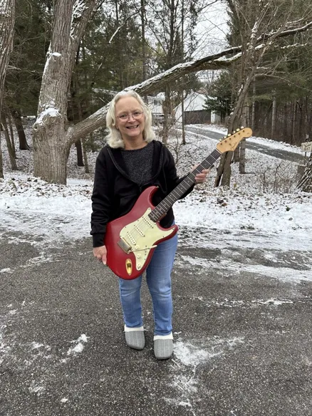 Mary's vintage 1963 Fender Stratocaster in rare Dakota Red Custom Color with factory gold hardware