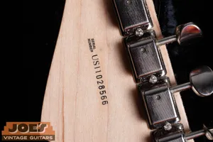 Fender US prefix serial number on the back of the headstock, 2010s onward