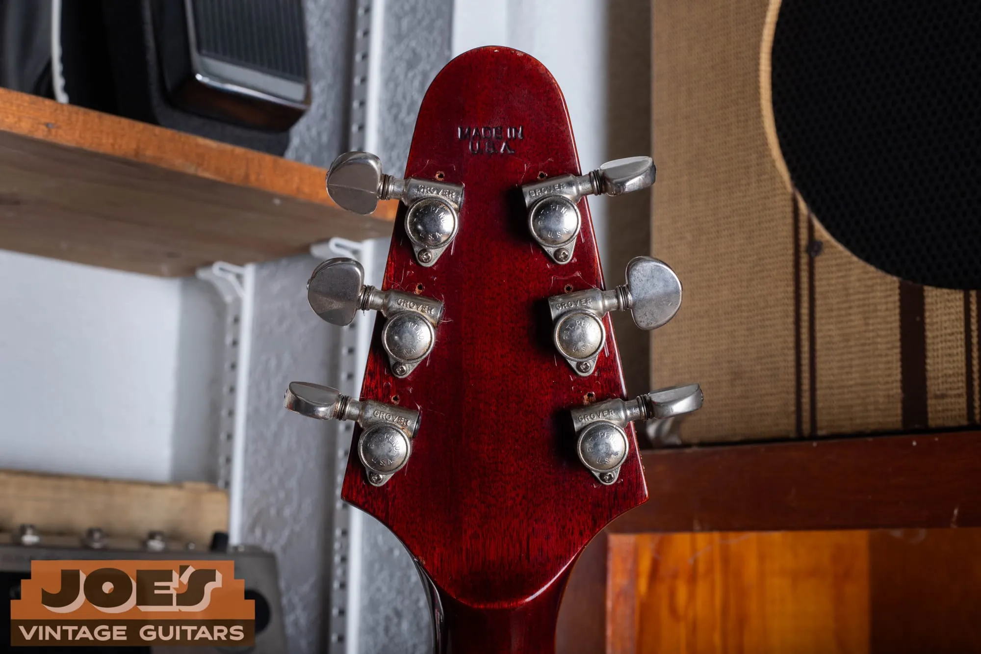 Back of the headstock on a 1971 Gibson Flying V Medallion, showing the impressed Made in U.S.A. stamp and the backs of the Grover tuners.