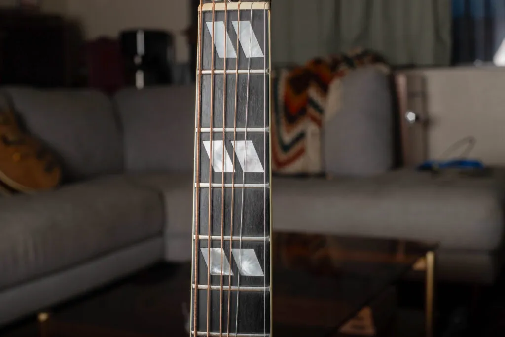 Close-up of the split-parallelogram mother of pearl inlays