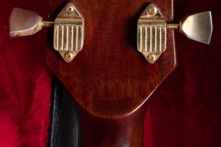 Volute on the back of a 1972 Gibson SG Custom neck, the raised wood reinforcement at the headstock and neck joint used from 1969 to 1981