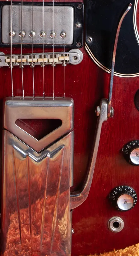 Sideways side-pull vibrola on a 1962 SG-body Les Paul