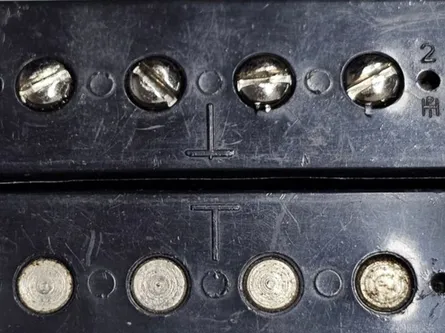 Gibson T-Top humbucker pickup with raised T molded in the bobbin