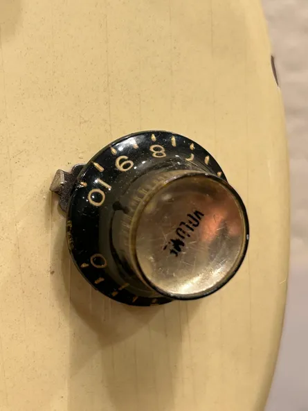 Gibson top hat reflector knob from 1960 to 1967, the taller wide-brimmed knob with reflector insert used on SGs, ES models, and late Les Pauls