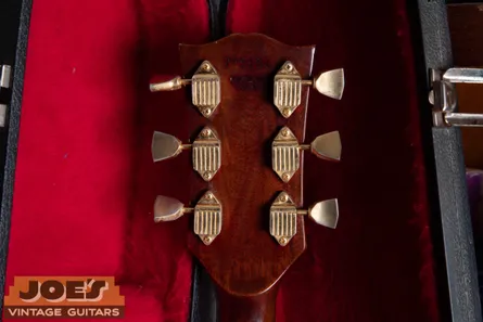 Gold Kluson waffle-back tuners on a 1972 Gibson SG Custom, with grid-textured back plate