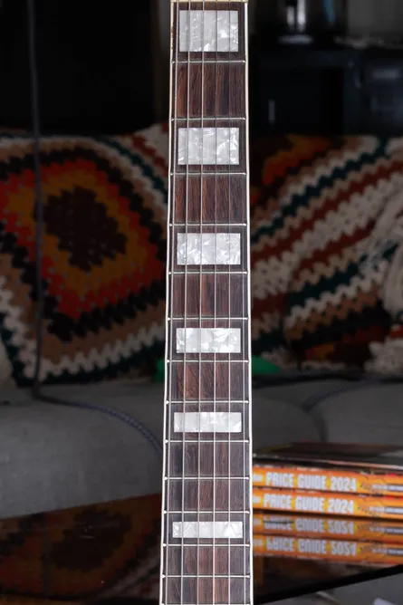 Gretsch block fingerboard inlays on a 1954 to 1956 era guitar, plain rectangular celluloid blocks