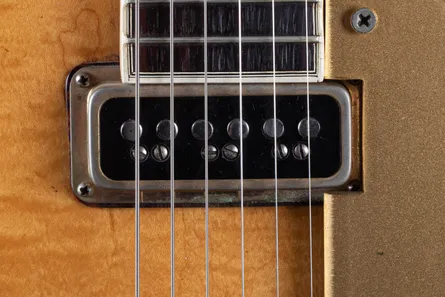 DeArmond DynaSonic pickup on a vintage Gretsch, two parallel rows of pole pieces and height-adjustment screws