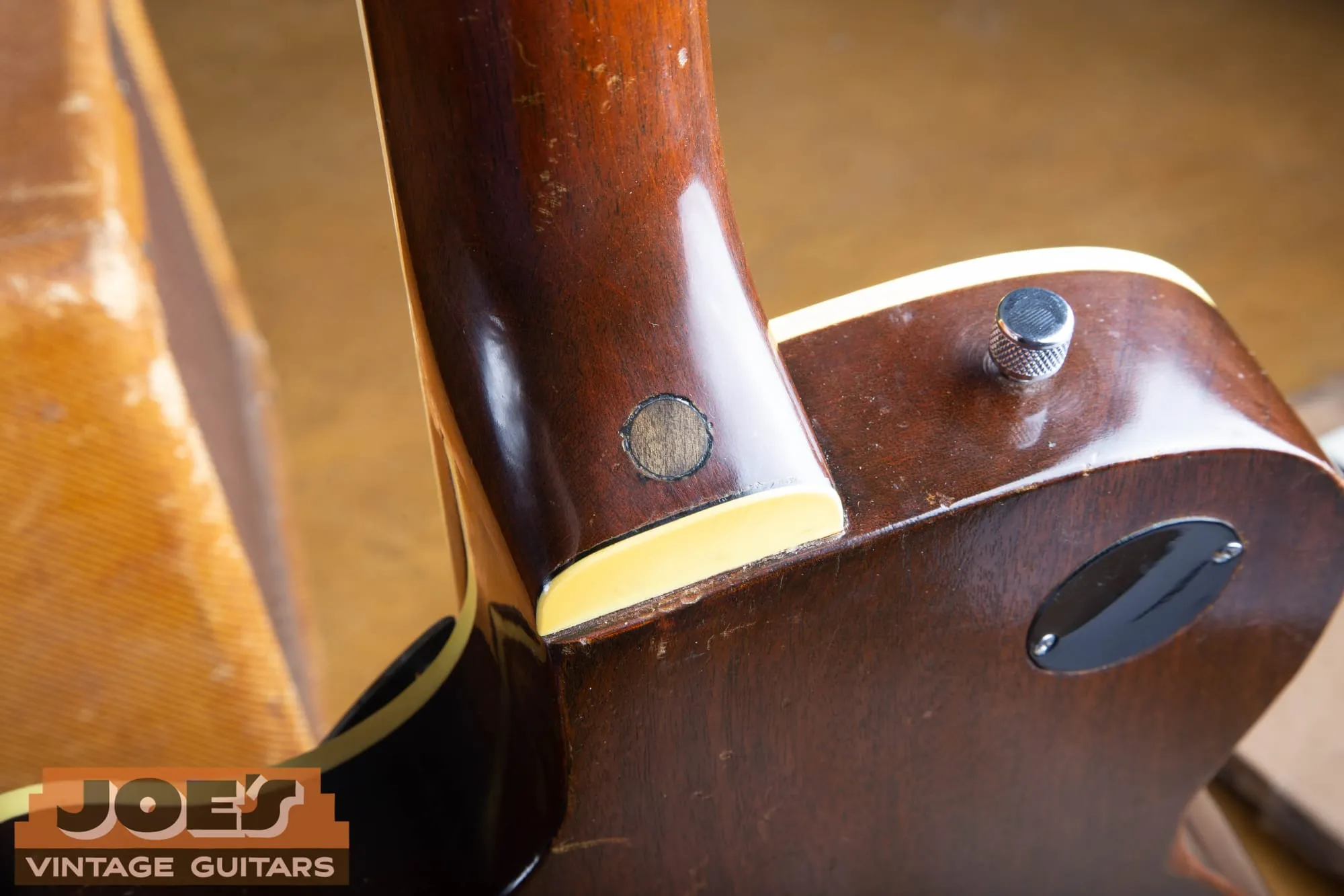 Close-up of the set-neck heel joint and binding on a vintage Gretsch Silver Jet.