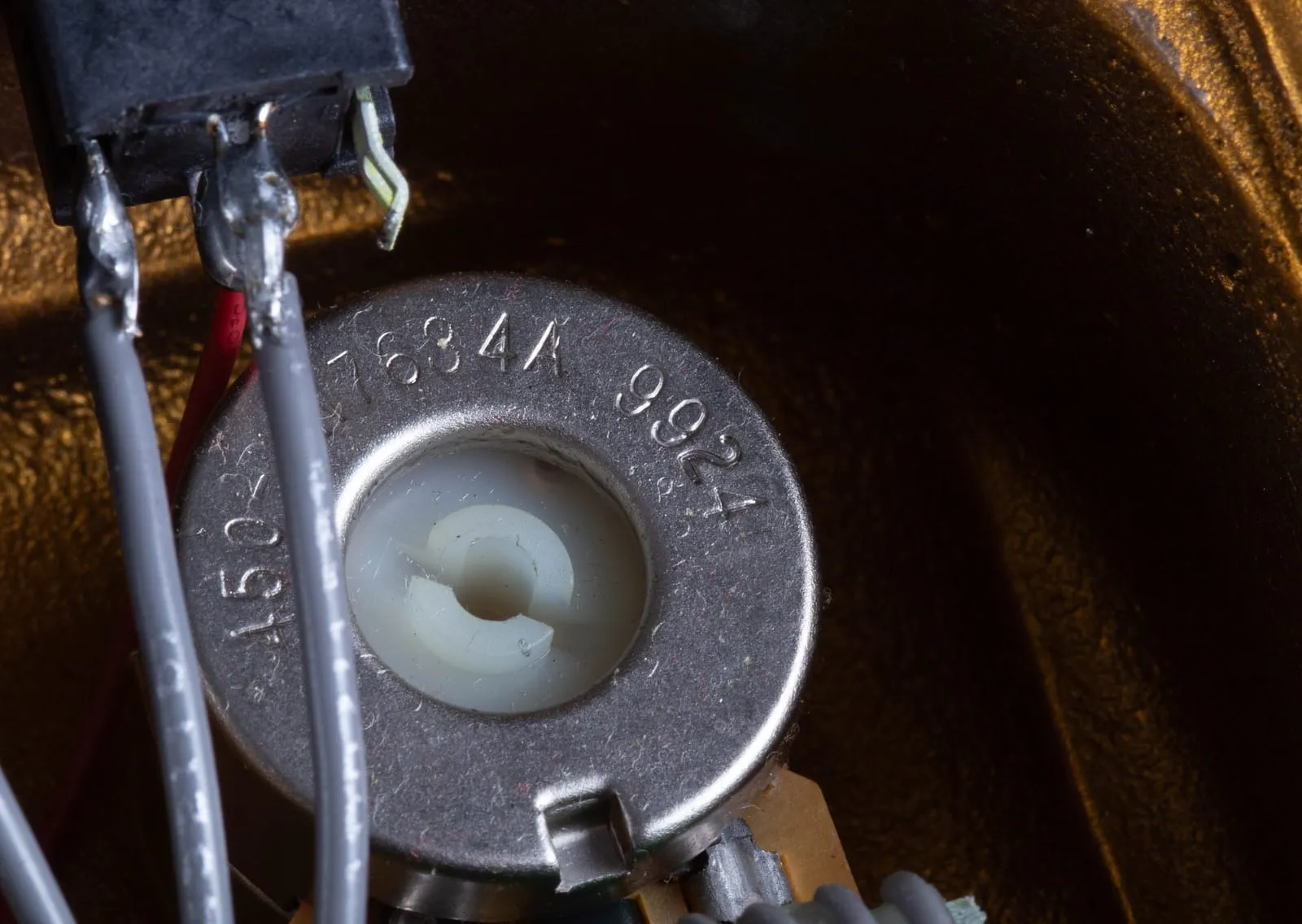 Close-up of a CTS potentiometer inside a Klon Centaur showing stamped markings including 7684A and the date code 9924.
