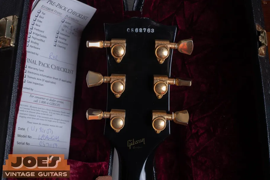 CS prefix ink-stamped serial number on the back of the headstock of a Gibson Custom Shop Les Paul