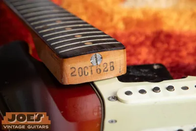 Authentic vintage Fender neck heel ink-stamped 2OCT62B, a genuine factory production date stamp