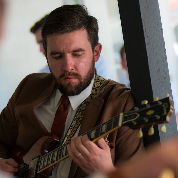 Joe Dampt playing guitar